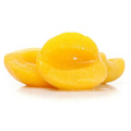 Консервированные / консервированные половинки / кубики / ломтики желтого персика в легком сиропе или в густом сиропе в жестяной упаковке или в стеклянной банке